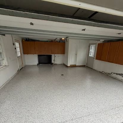 Finished garage with a light gray and white flake epoxy floor, Central New York