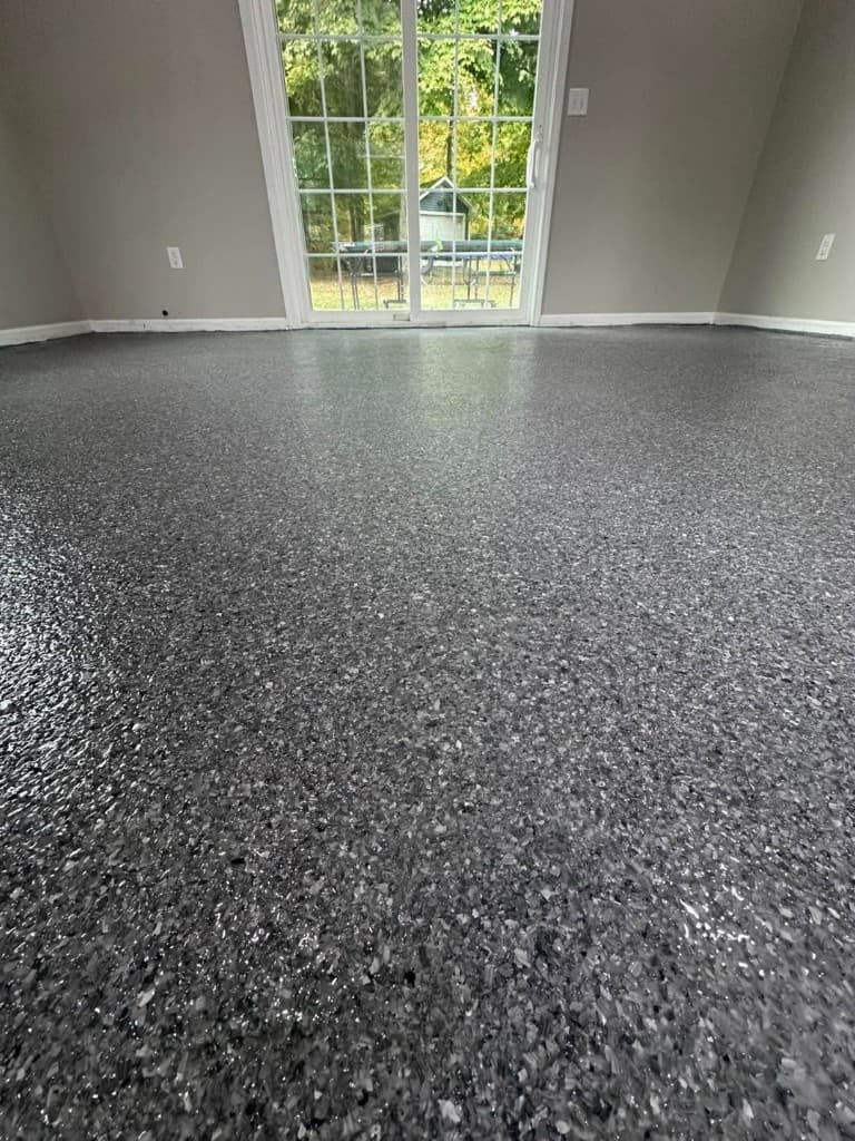 Smooth, easy-clean coated floor suited to a commercial kitchen or food-prep space